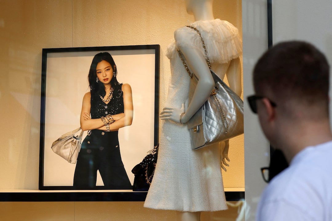 A man looks at a Chanel shop window at Bahnhofstrasse in Zurich