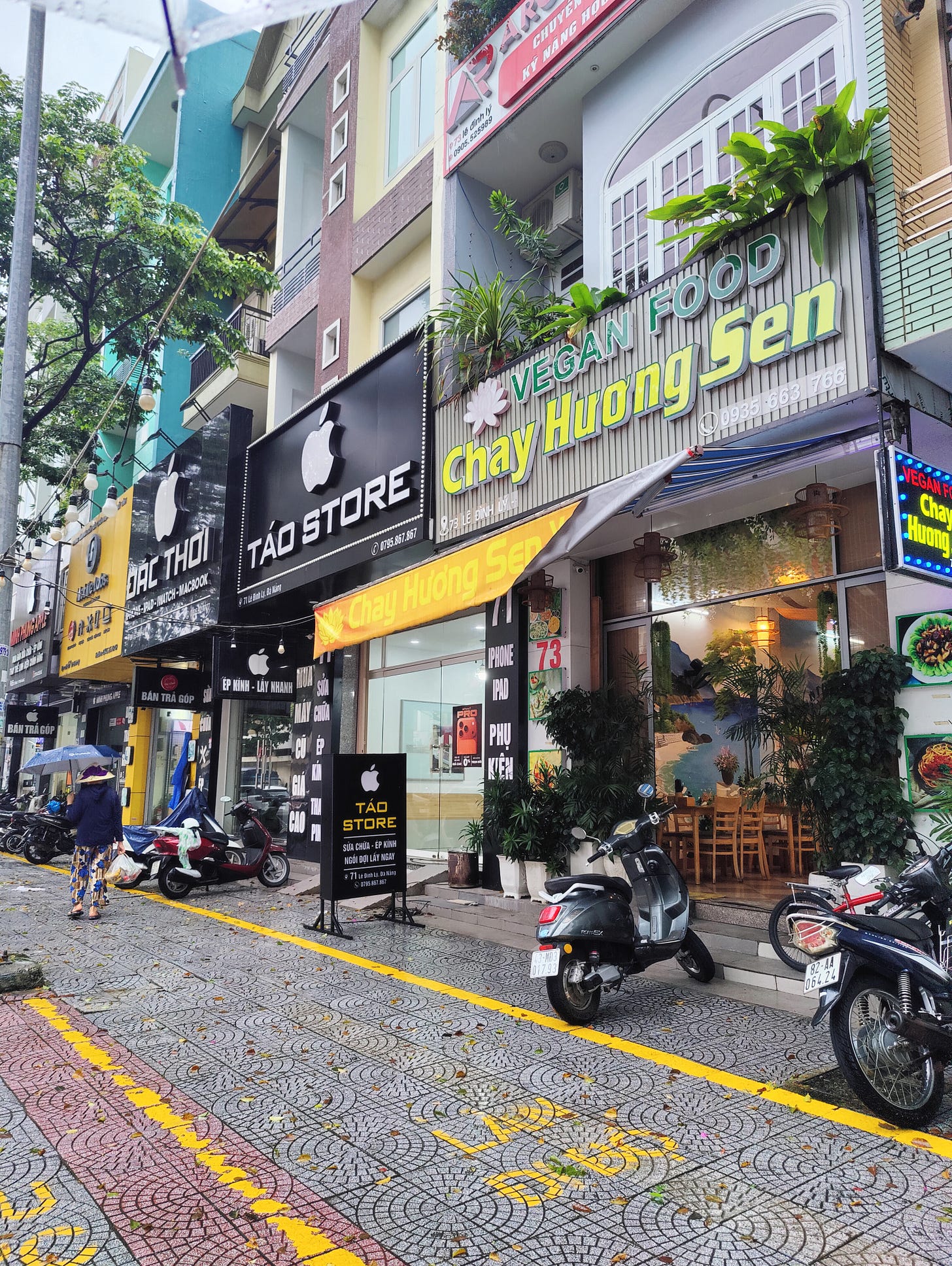 outside a restaurant with a vegan sign outside a restaurant with a vegan sign