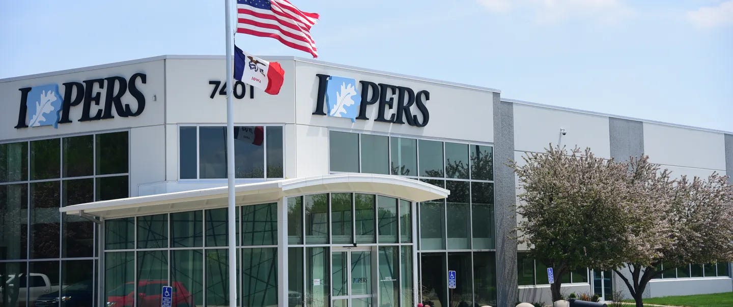 Exterior of IPERS headquarters in Des Moines, with IPERS signage and the U.S. and Iowa flags flying outside. Exterior of IPERS headquarters in Des Moines, with IPERS signage and the U.S. and Iowa flags flying outside.