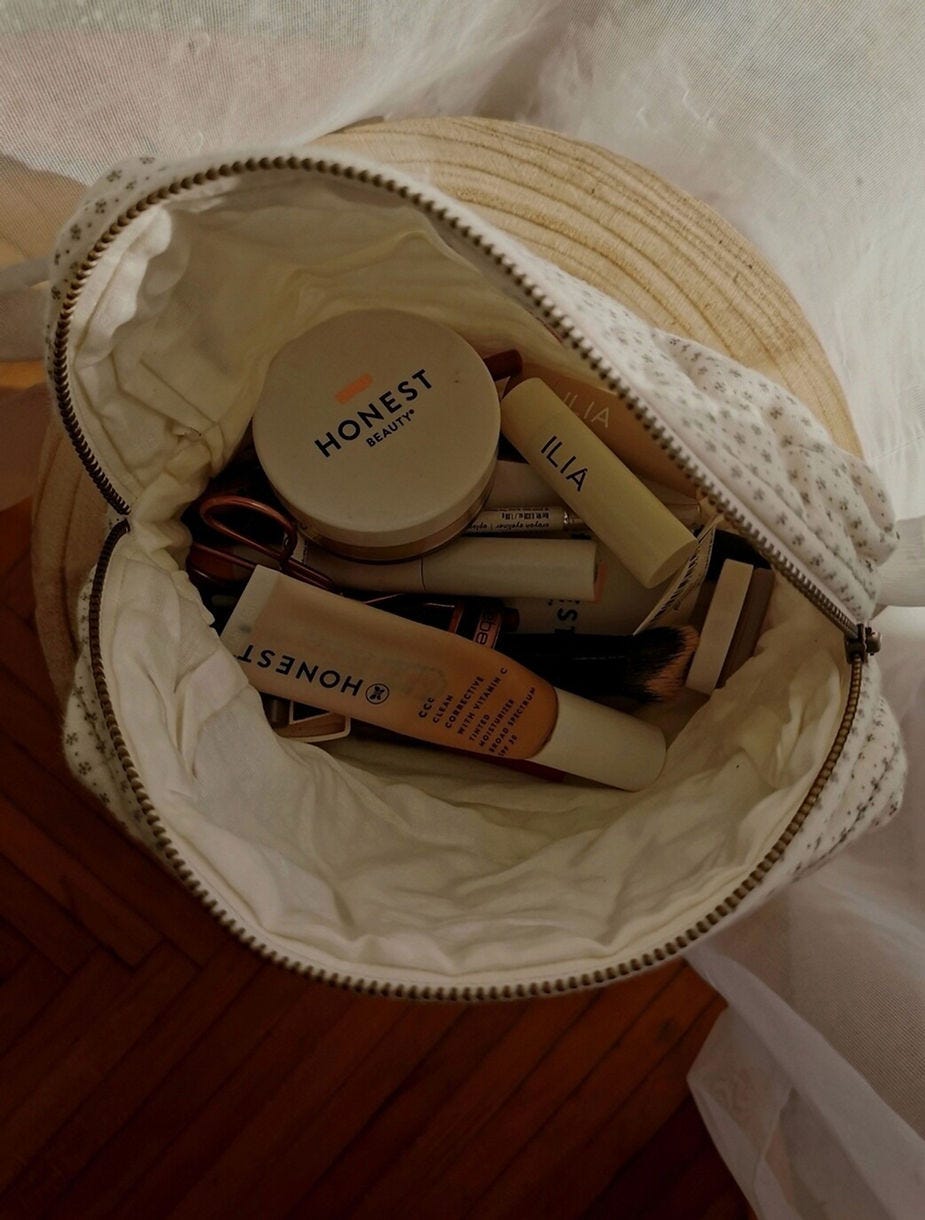 Quilted white floral makeup bag