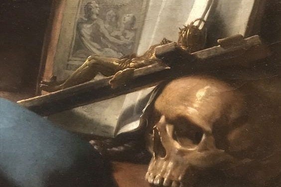 This may contain: a painting with a skull and cross on it's table next to an open book