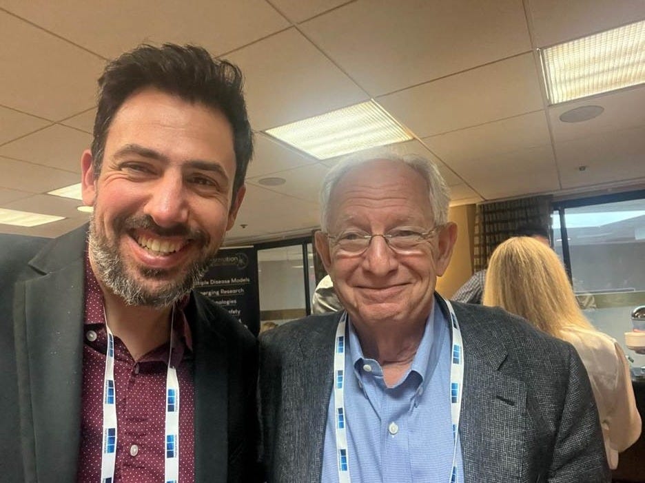 A person and person smiling for a picture

AI-generated content may be incorrect.