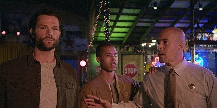 Walker Cordell watches firebombed car blaze with James and son DJ. Walker Cordell watches firebombed car blaze with James and son DJ.