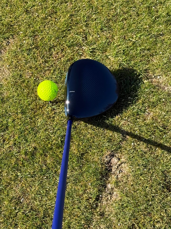 two photos of the Mizuno JPX One driver
