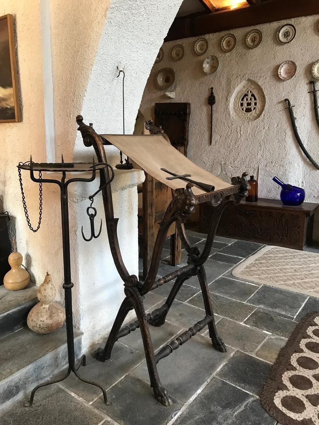 A old fashioned paper stand in a room
AI-generated content may be incorrect.
