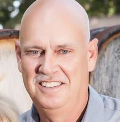 A photograph of Tommy Ballard. A photograph of Tommy Ballard.