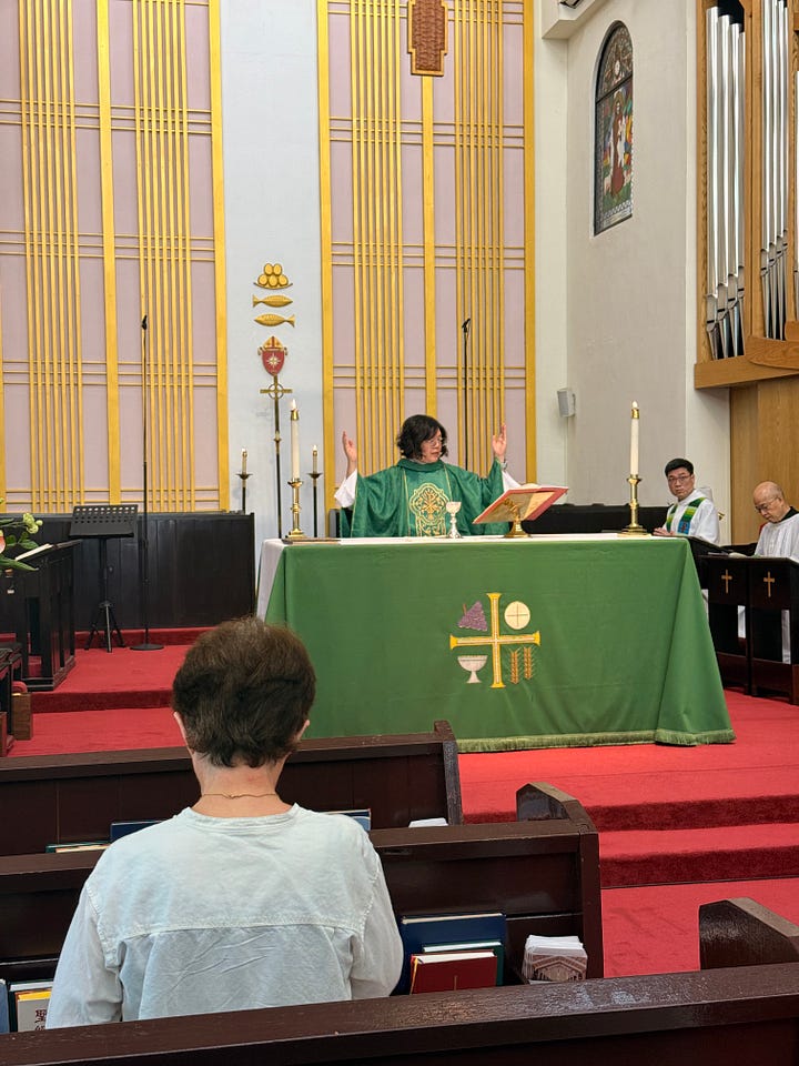 People praying in a temple; a priest praying in a Cathedral. Taiwan.