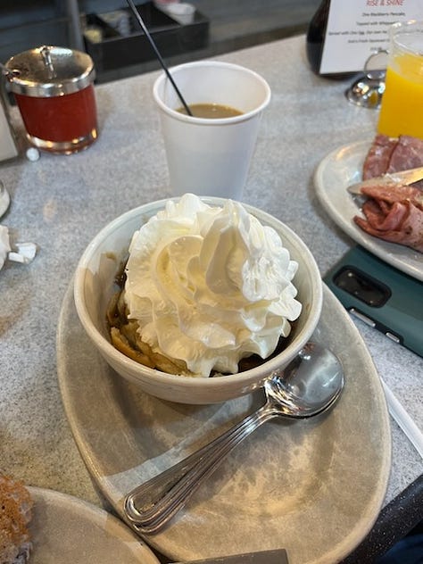 Left to right: 1. Wienermobile at a stoplight 2. Bowl on a table filled with whipped cream and an apple dumpling underneath 3. Four dumplings shaped like birds on cucumber slices and a bright cocktail to the right.