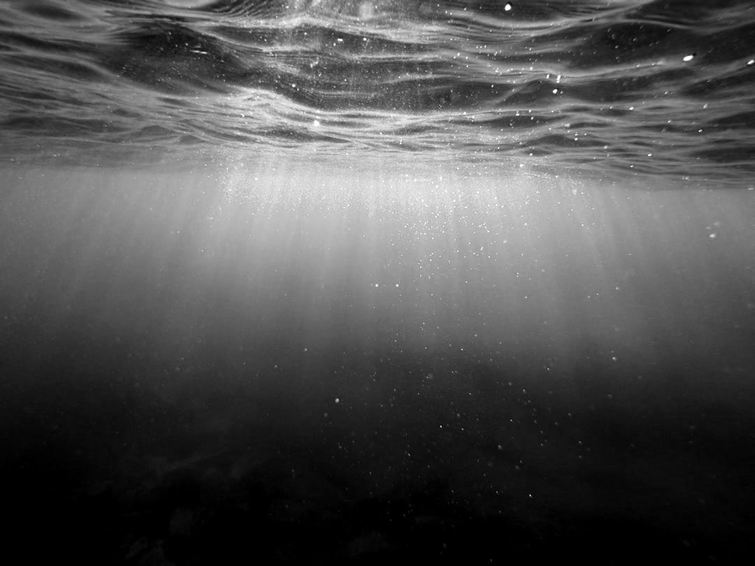 clear blue body of water