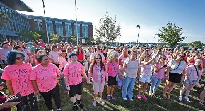 Supporters in pink rally for Lindsay Clancy outside courtroom Supporters in pink rally for Lindsay Clancy outside courtroom