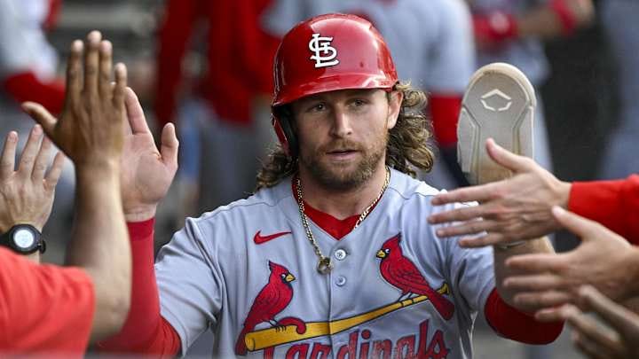 Jun 17, 2025; Chicago, Illinois, USA;  St. Louis Cardinals second baseman Brendan Donovan (33) celebrates in the dugout after he scores during the second inning against the Chicago White Sox at Rate Field. Mandatory Credit: Matt Marton-Imagn Images