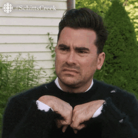 Schitt's Creek gif. David curls his hands in front of his chest and grimaces in disgust. Schitt's Creek gif. David curls his hands in front of his chest and grimaces in disgust.