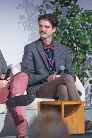 Brandon Lenzi on the stage at the Elevate Conference.