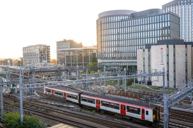 A train leaves a city centre train station A train leaves a city centre train station