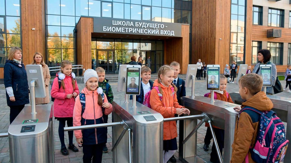 Friendly banker can't stop cattle-tagging Russian children