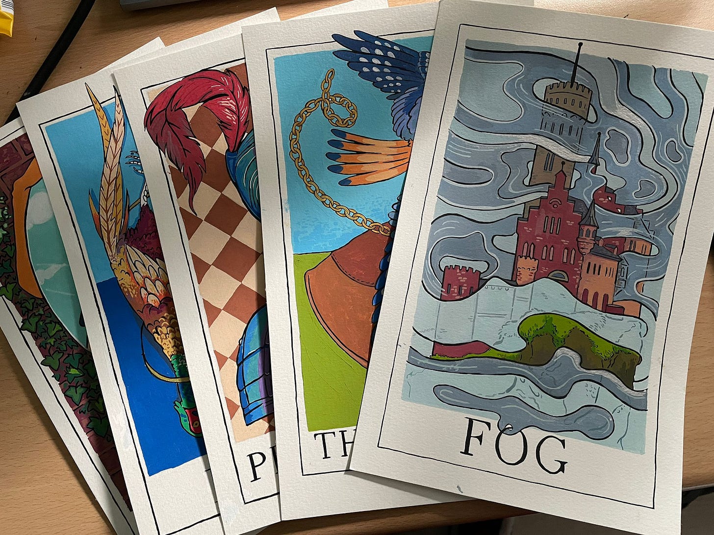 A selection of brightly coloured, handmade tarot cards A selection of brightly coloured, handmade tarot cards
