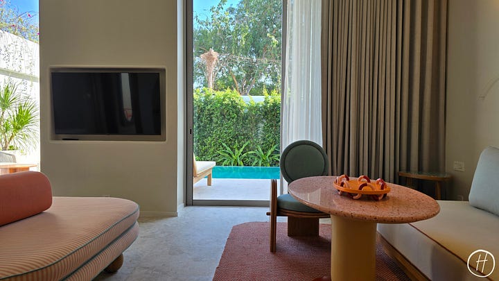 Deluxe One Bedroom Suite with Private Pool: The Bedroom and Living area