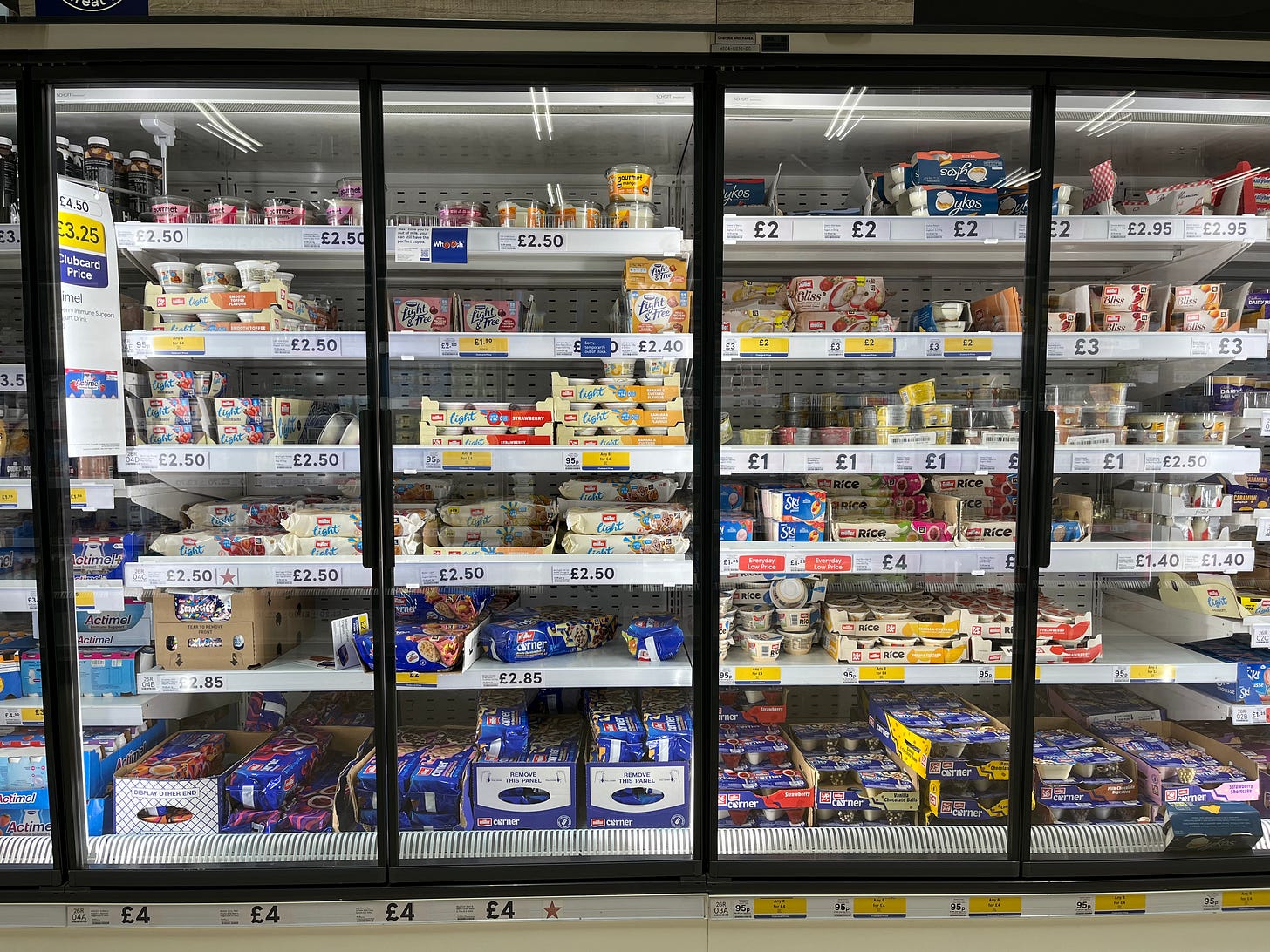 Photo of the yoghurts section in a supermarket. Photo of the yoghurts section in a supermarket.
