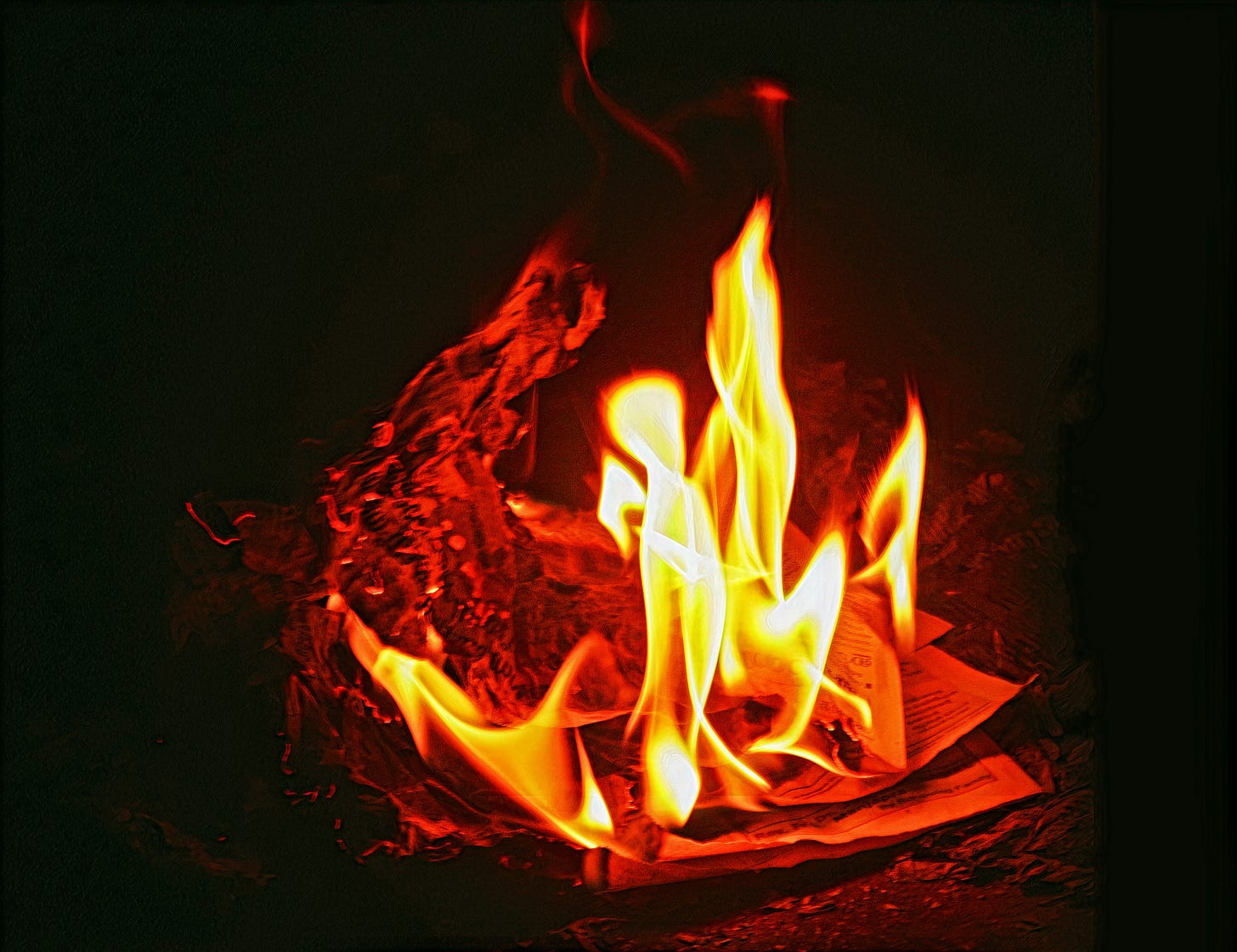 written pages on fire (writer burnout)