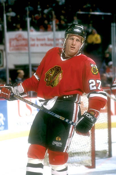 Jeremy Roenick of the Chicago Black Hawks looks on during a hockey game against the Washington Capitals on March 8, 1994 at USAir Arena in Landover,...