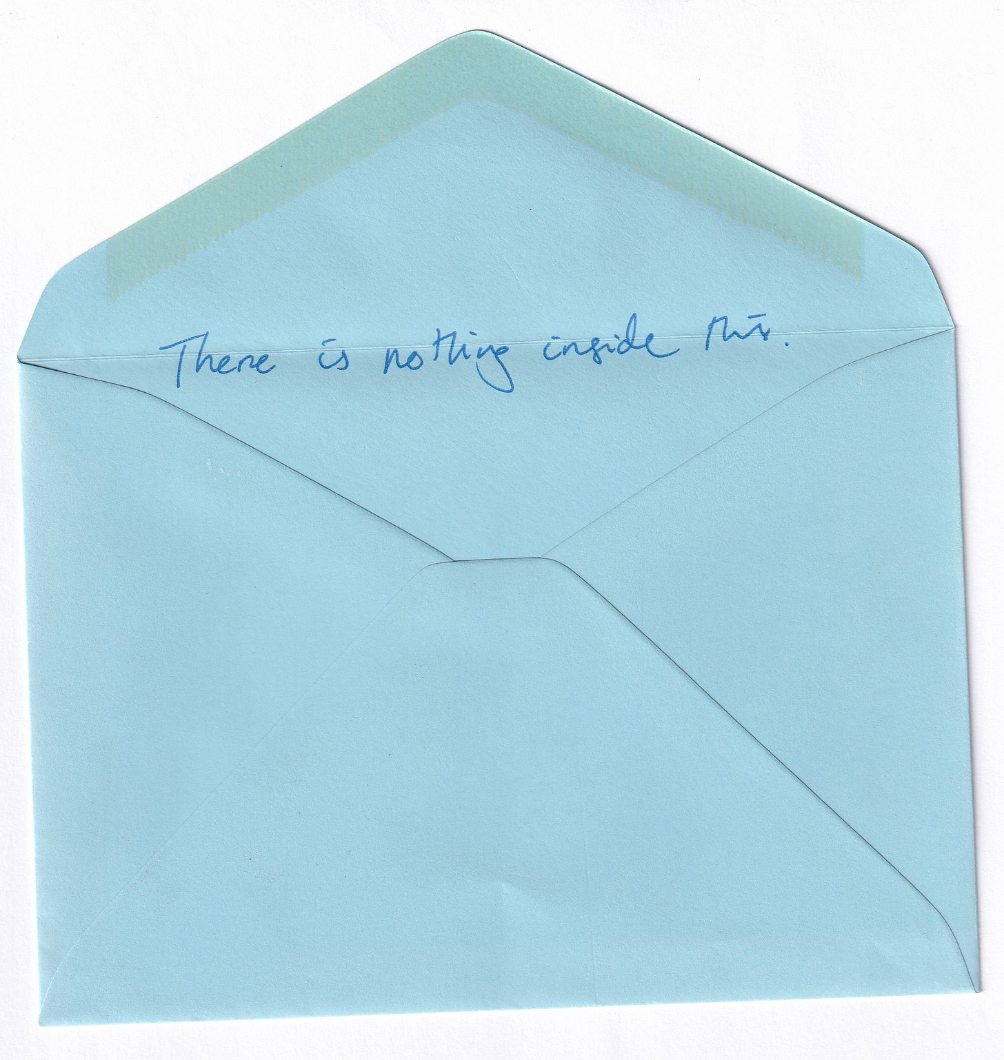 It's the reverse of the same blue envelope. In blue rollerball pen it says 'there is nothing inside this' in the crease between the envelope flap and the pouch