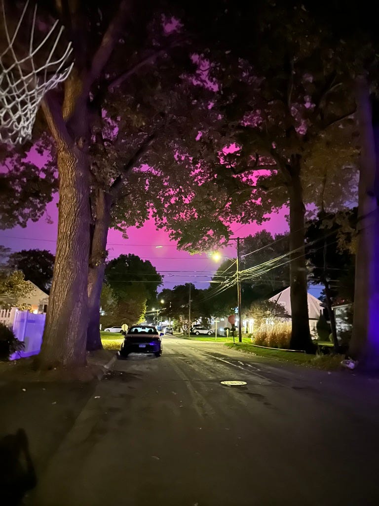 A car parked on a street

Description automatically generated
