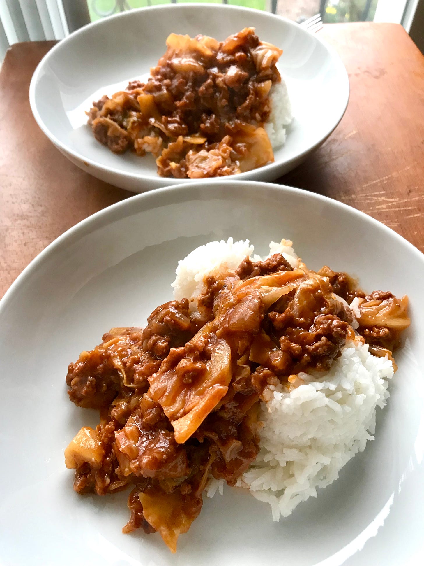 cabbage casserole served over white rice