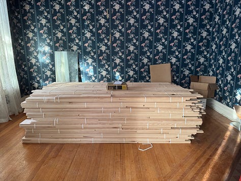 Six photos, three of interior fire damage, two of ongoing repairs, and one of a stack of flooring. 