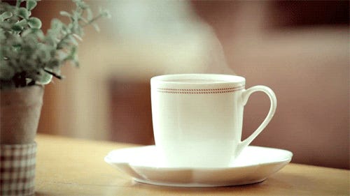 Steaming cup of coffee - animated gif - old school, simple white, smallish, cup and saucer 