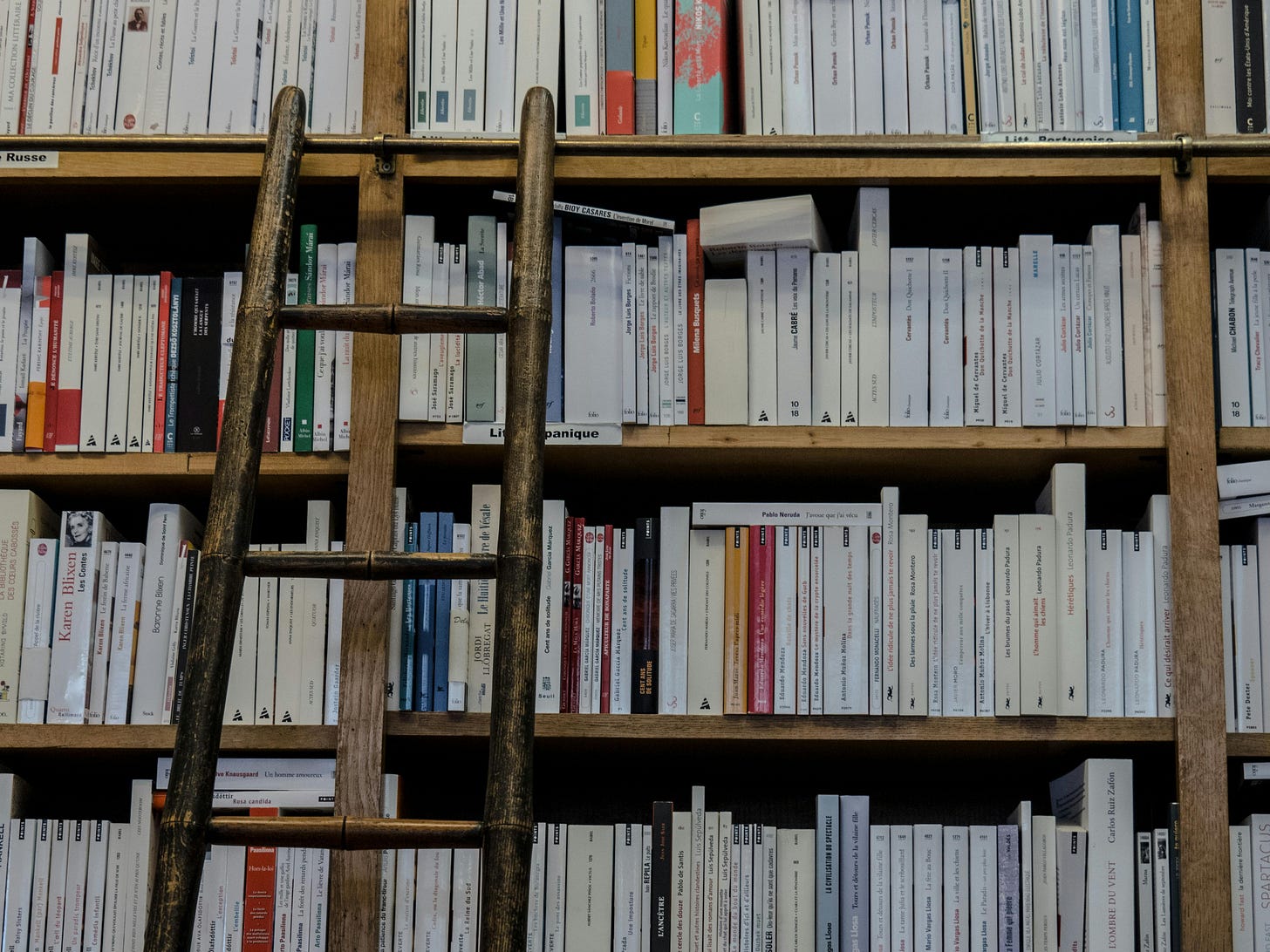 Brown Wooden Ladder on Brown Wooden Bookshelf · Free Stock Photo