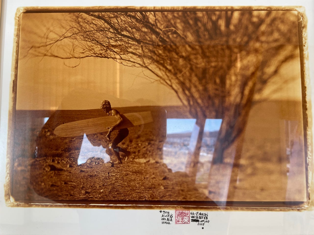 Photo of a photo of a surfer from Surf Art from the collection of Kevin King. Photo by arod of the photo.