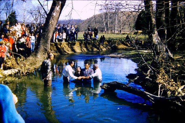 Baptism in a creek.