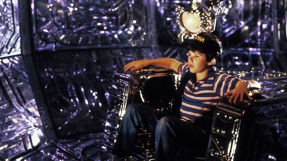 A young boy pilots an alien spaceship