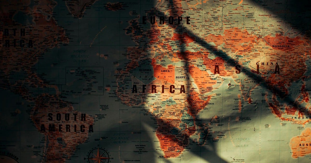 From above of sunlit aged paper world map with continents countries and oceans