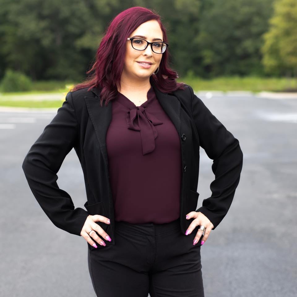 May be an image of 1 person, standing and outdoors