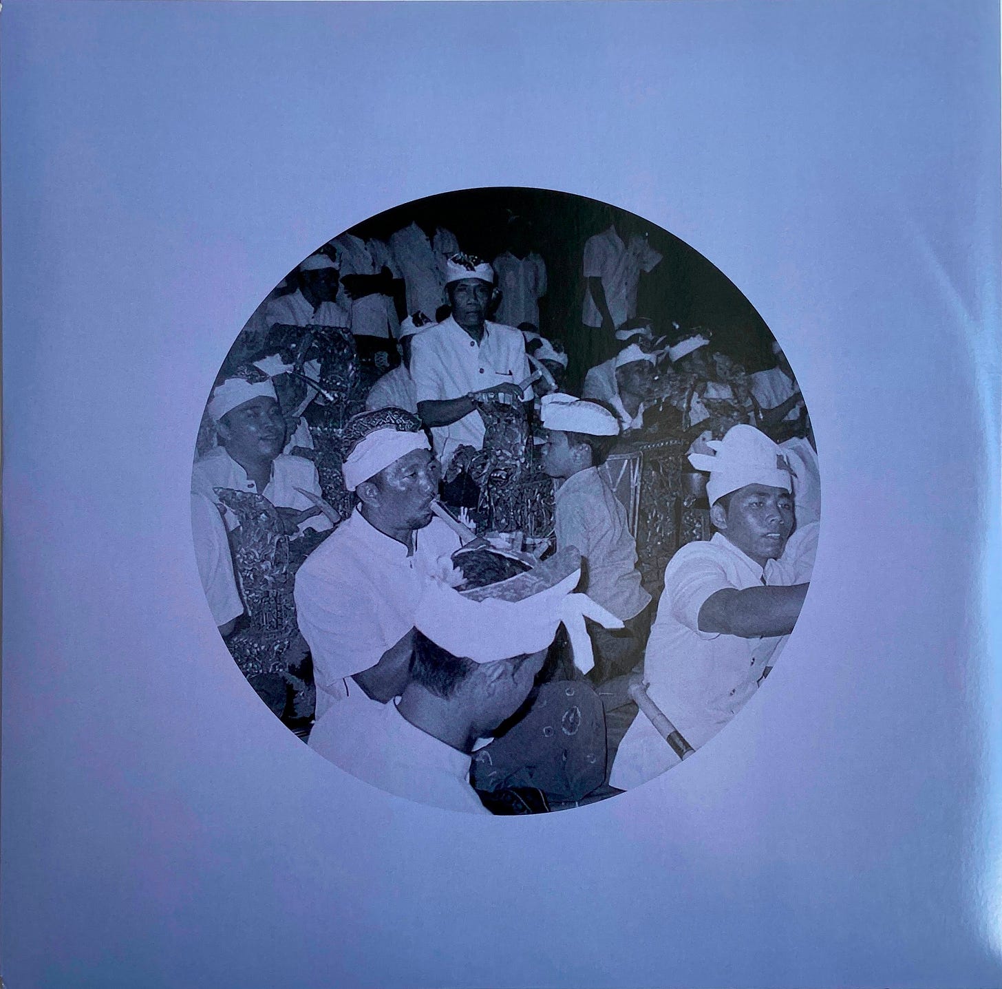 the album’s periwinkle record sleeve, featuring Indonesian men of various ages playing instruments