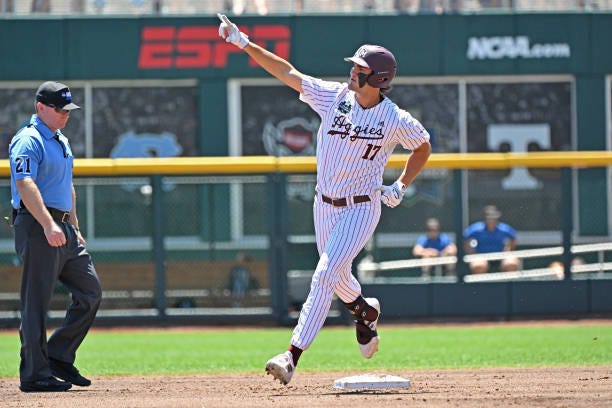 Jace Laviolette of the Texas A&M Aggies reacts after hitting a solo home run in the first inning against the Tennessee Volunteers during the NCAA...