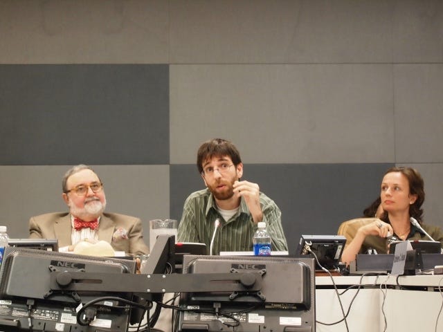 Pictured here: BJ Mendelson debating the ambassador to Pakistan at the United Nations, giving a presentation on privacy at George Mason University, promoting the "City of Joel" documentary, and appearing on CNN.