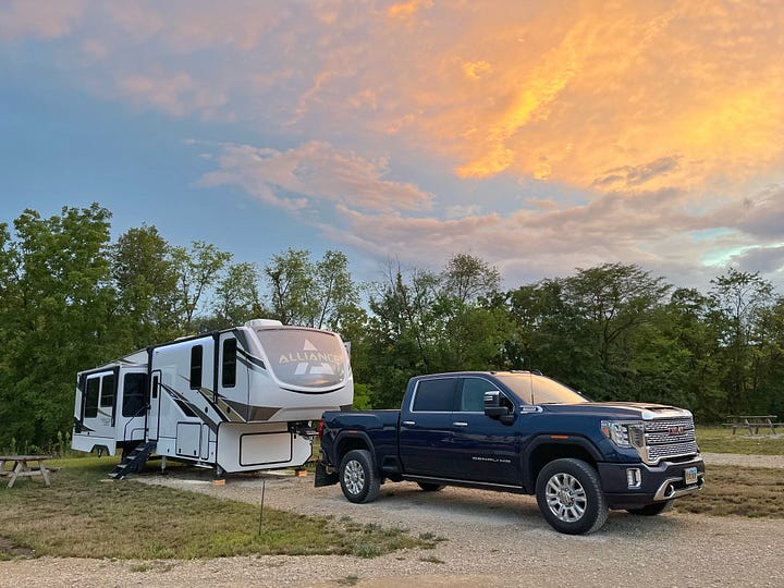 Our campsite and a hot air balloon at Crow's Nest RV Resort in Indianola, Iowa