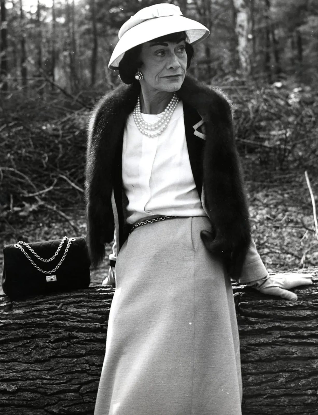 Iconic Fashion Pieces: Chanel 2.55 Bag - Glam Observer