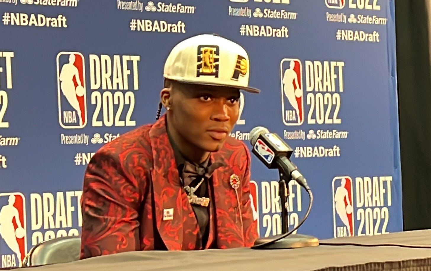 Benn Mathurin at the podium after being drafted by the Pacers.
