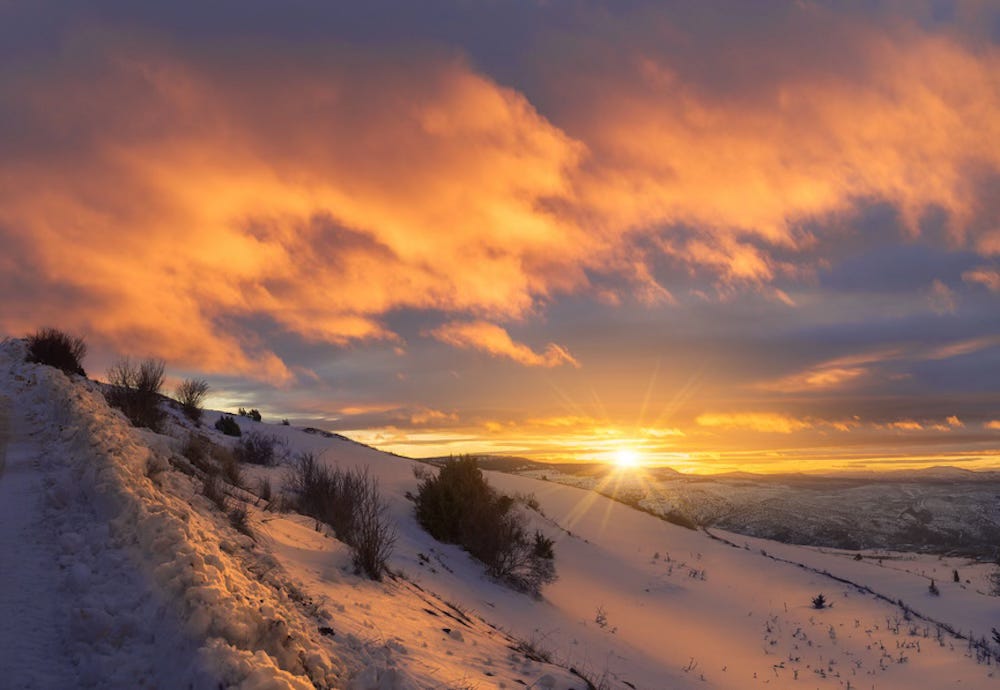Beautiful winter sunset in a snowy landscape. 