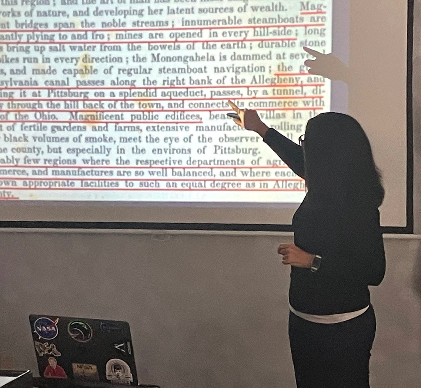 May be an image of studying and text