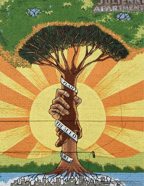 Mural in Stockton, California depicting a tree and promoting the SEED project Mural in Stockton, California depicting a tree and promoting the SEED project