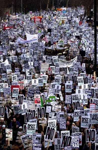 Protesters march along the Embankment in London as part of the anti-Iraq War march organised by the Stop the War Coalition, 15 February 2003. Embankment was one of two assembling points for the huge London march.