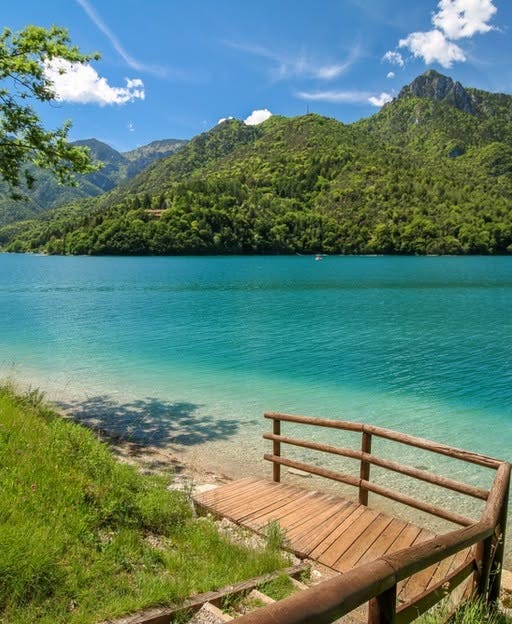 May be an image of lake, nature and mountain