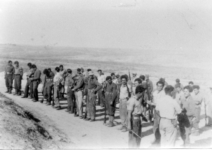 A group of armed men A group of armed men