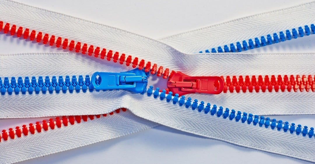 photo of red and blue zippers