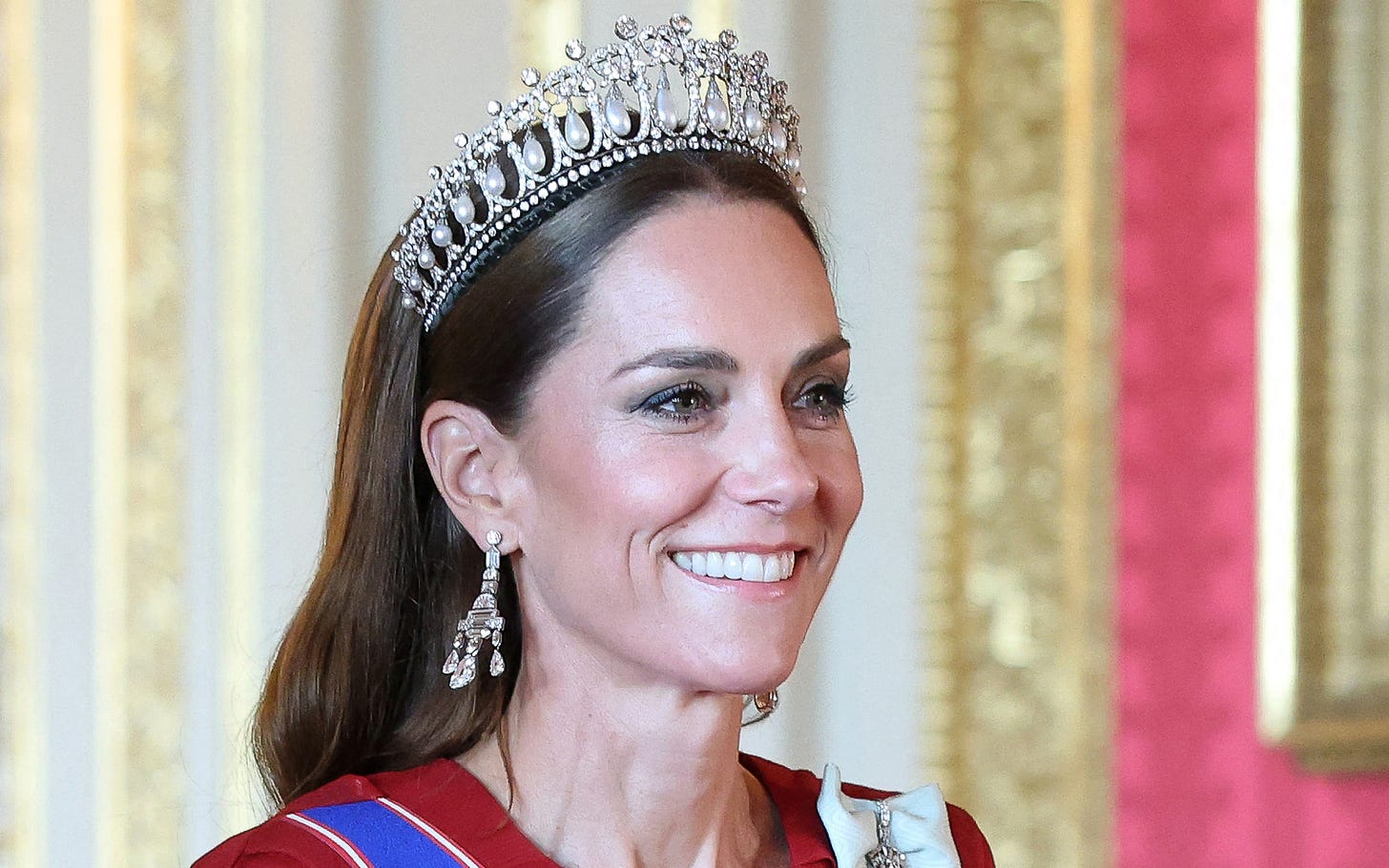 Princess of Wales wearing red dress and tiara