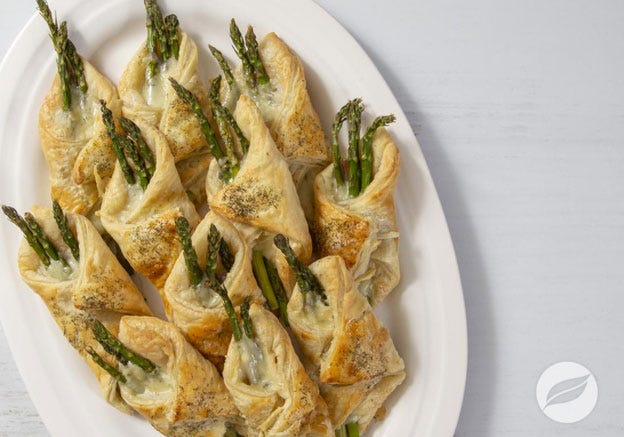 Asparagus Prosciutto & Gruyere Puff Pastry on a white plate
